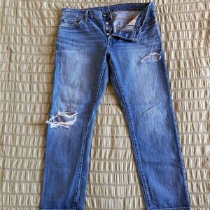 Levi's Ripped Boyfriend Jeans in Faded Blue